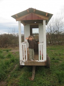 Dottie says "hello" and "good bye" from the little porch of the play house!