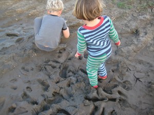 The mud play begins at a muddy spot by our well.